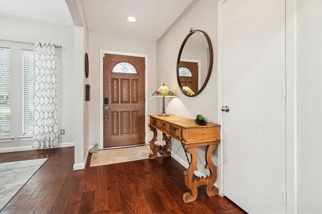 a view of a livingroom with furniture and wooden floor
