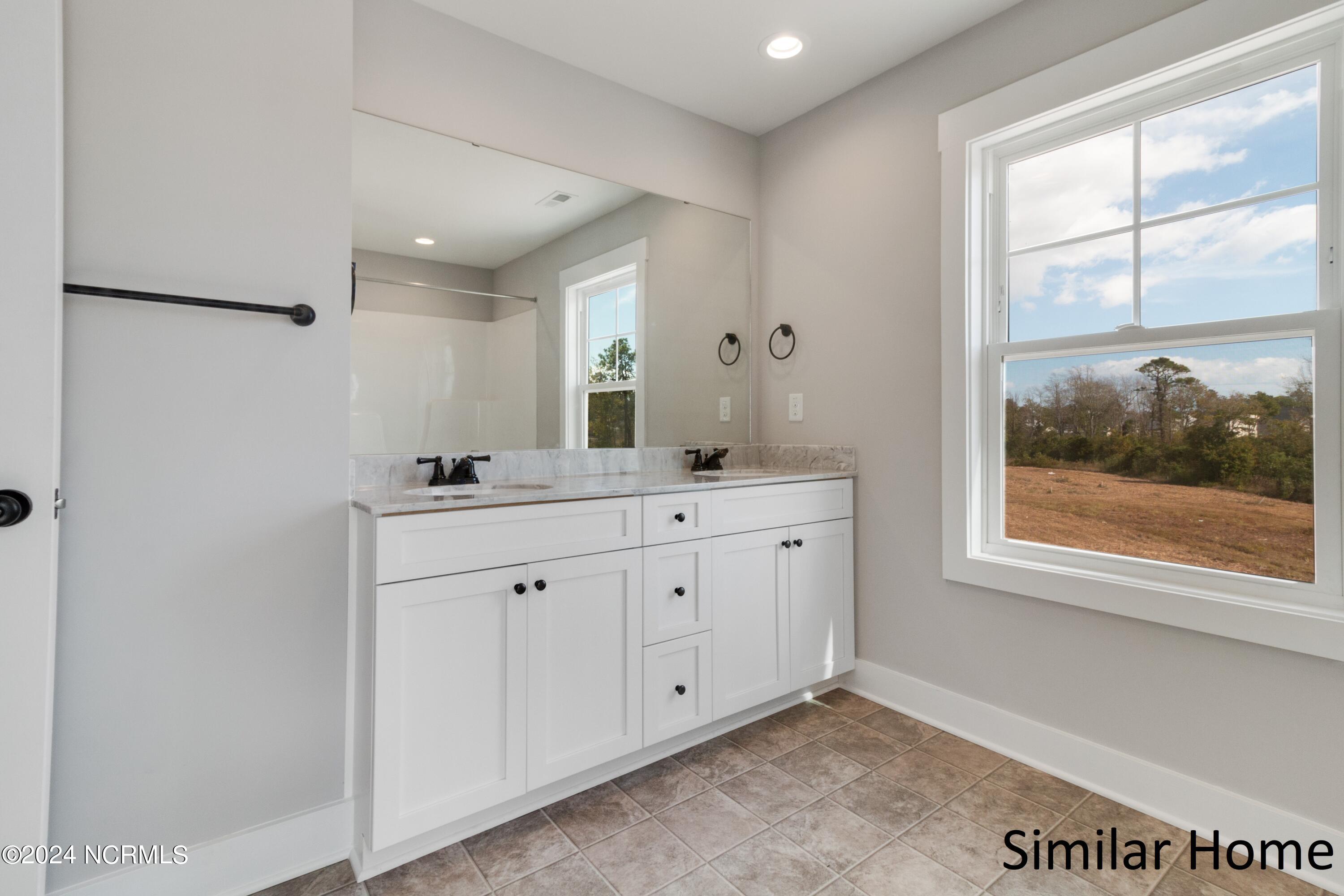 403 Bay Harbor Hubert, NC 28539 - Photo 18 of 29 LVP is standard in all wet areas