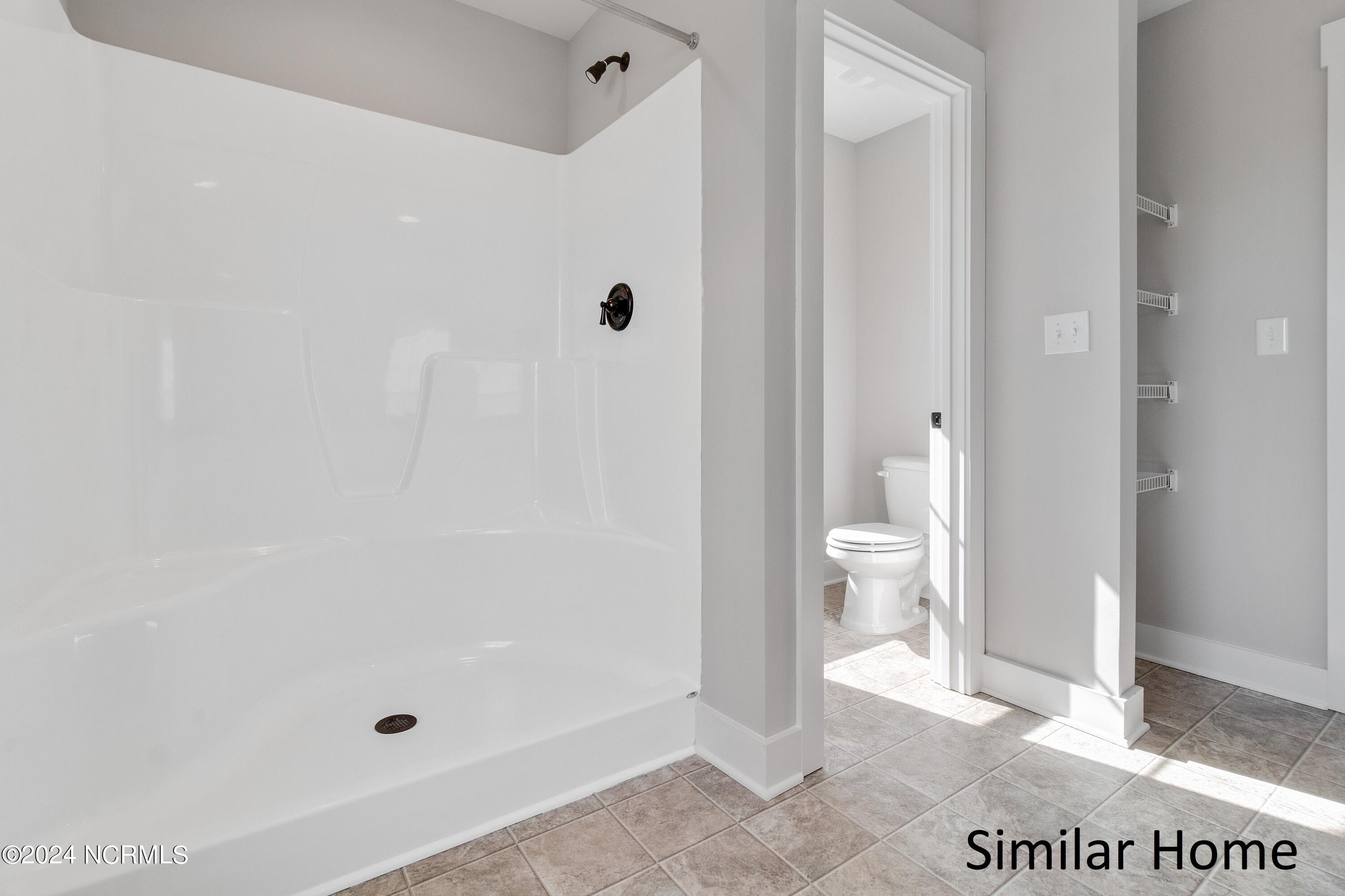 403 Bay Harbor Hubert, NC 28539 - Photo 19 of 29 LVP is standard in all wet areas