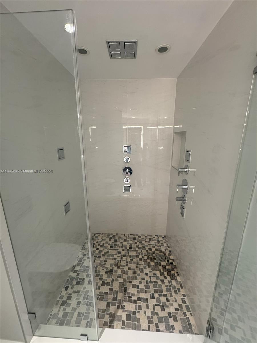 5970 Indian Creek Drive, Unit PH3 Miami Beach, FL 33140 - Photo 11 of 37 a bathroom with a shower