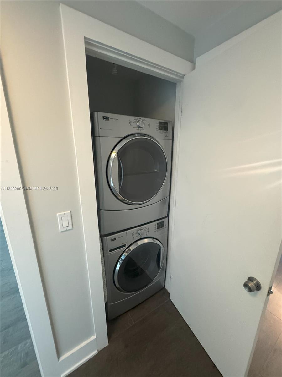 5970 Indian Creek Drive, Unit PH3 Miami Beach, FL 33140 - Photo 18 of 37 a utility room with dryer and washer