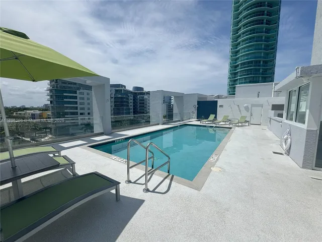 a view of a lake with a city