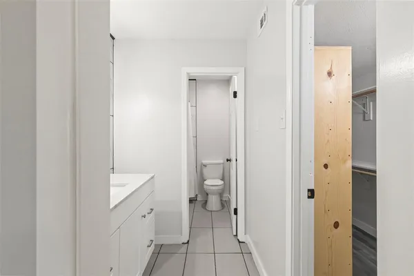 a bathroom with a toilet