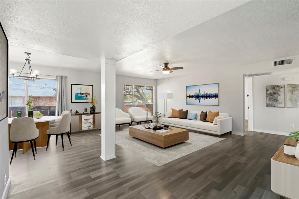 10526 Stone Canyon Road, Unit 201 Dallas, TX 75230 - Photo 3 of 28 a living room with furniture and a wooden floor