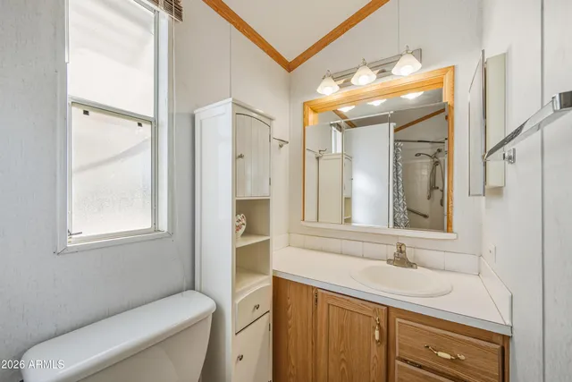 a view of a patio with table and chairs