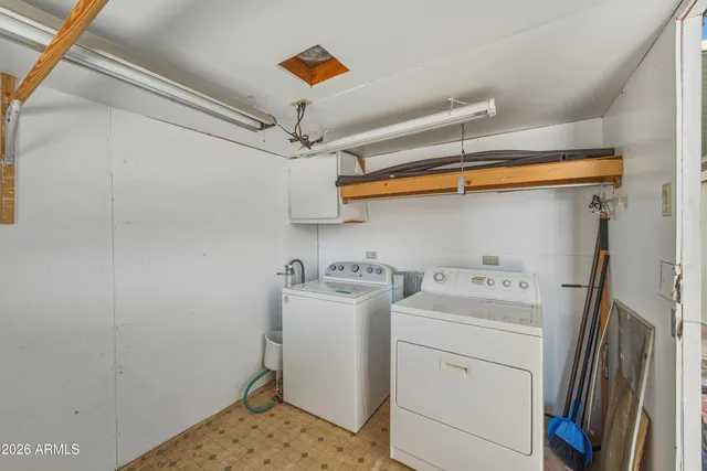 a view of a dinning table and chairs in the patio