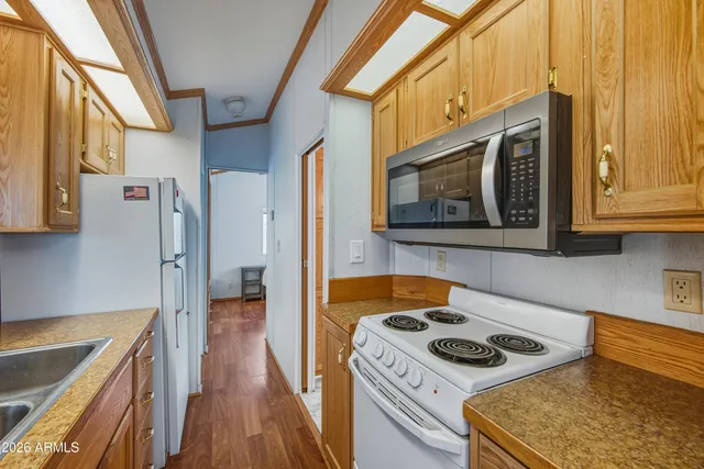 a bathroom with a shower curtain and a toilet
