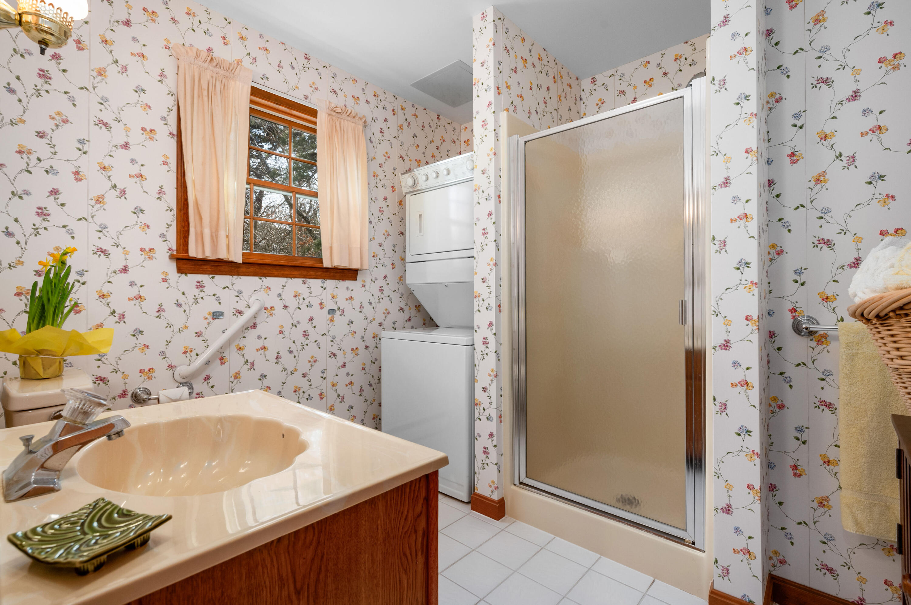 55 Bow Road Eastham, MA 02642 - Photo 12 of 44 a bathroom with a sink and a shower
