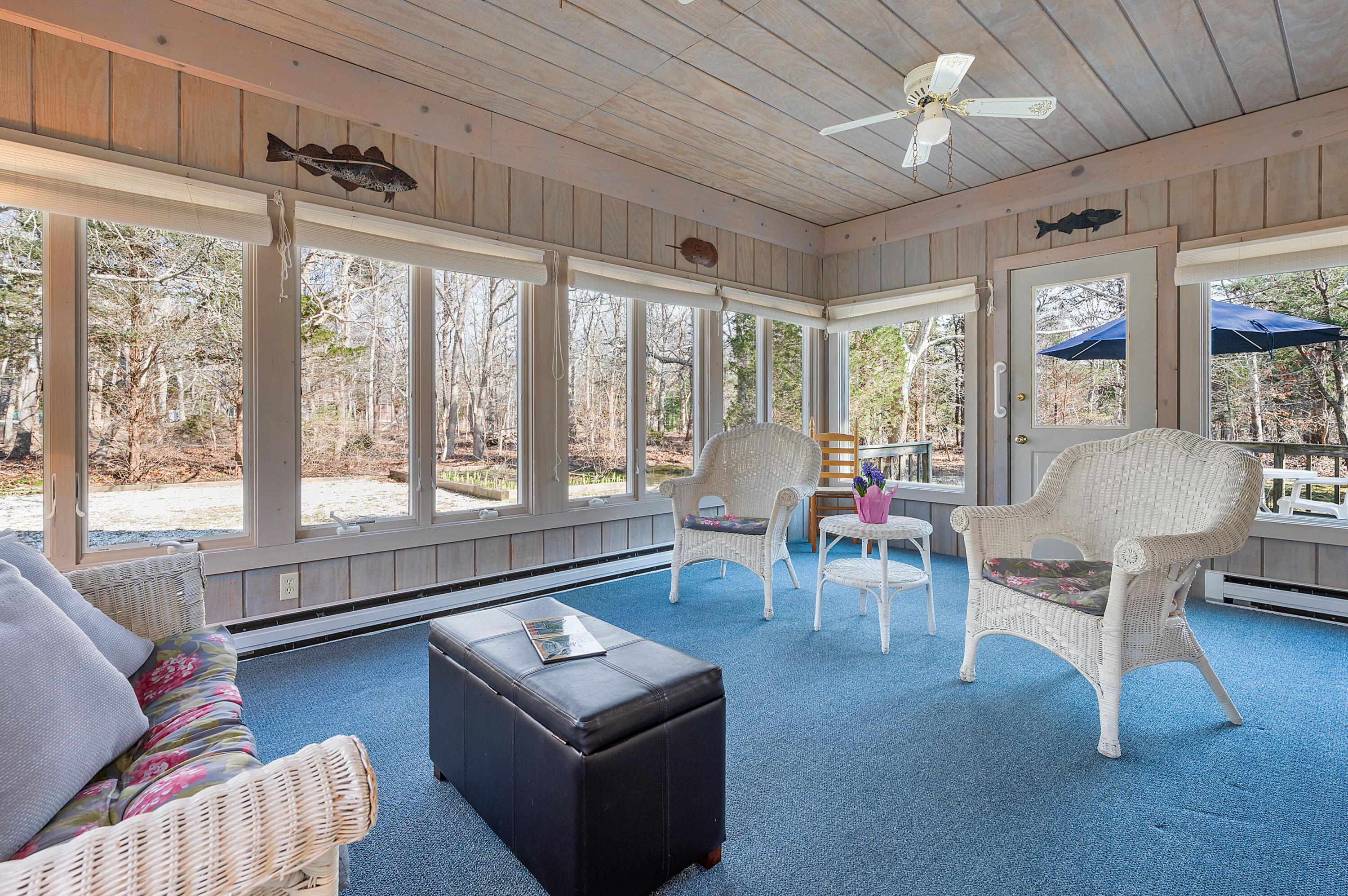 55 Bow Road Eastham, MA 02642 - Photo 15 of 44 a living room with furniture and a large window