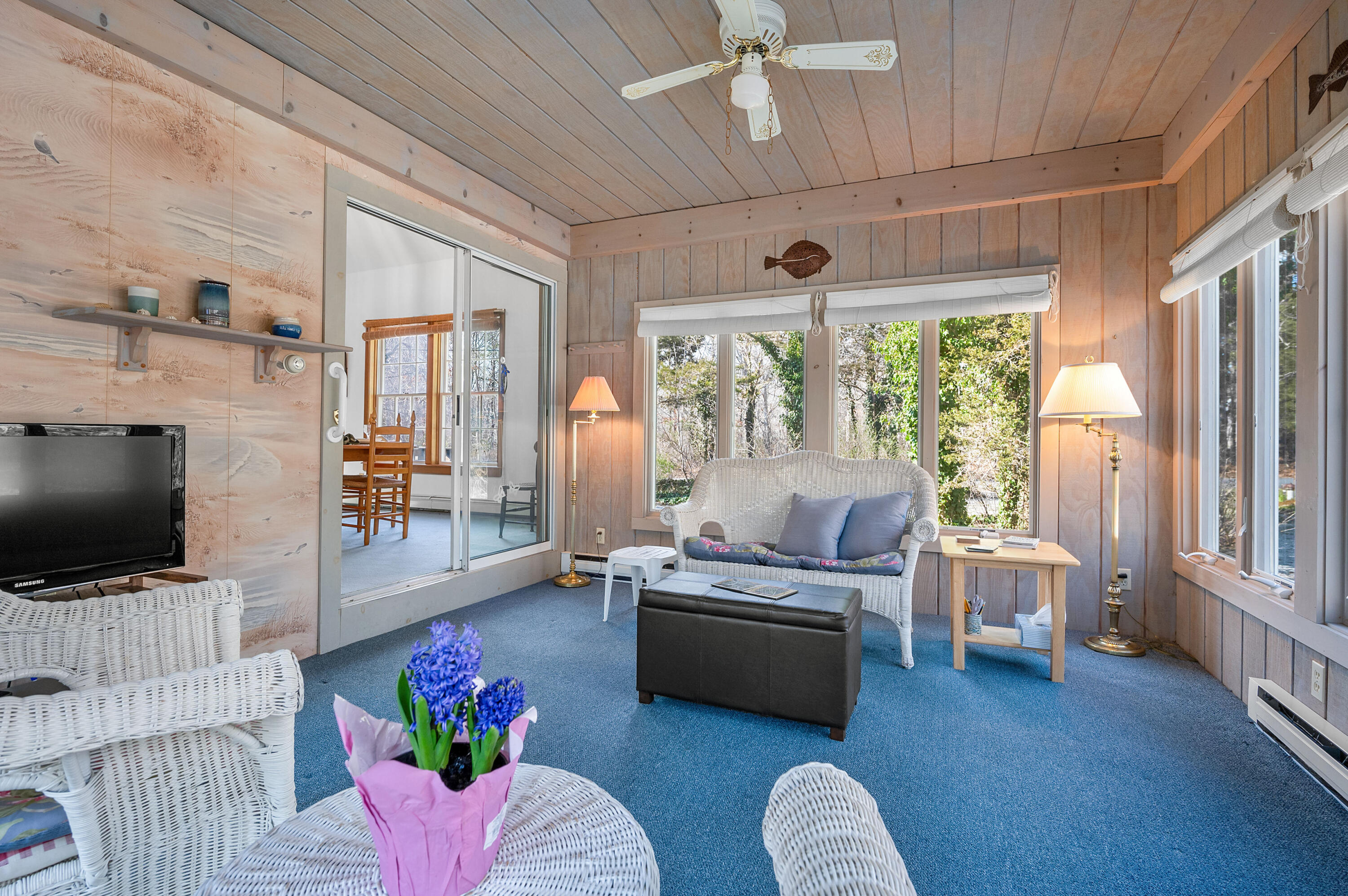 55 Bow Road Eastham, MA 02642 - Photo 18 of 44 a living room with furniture and a flat screen tv