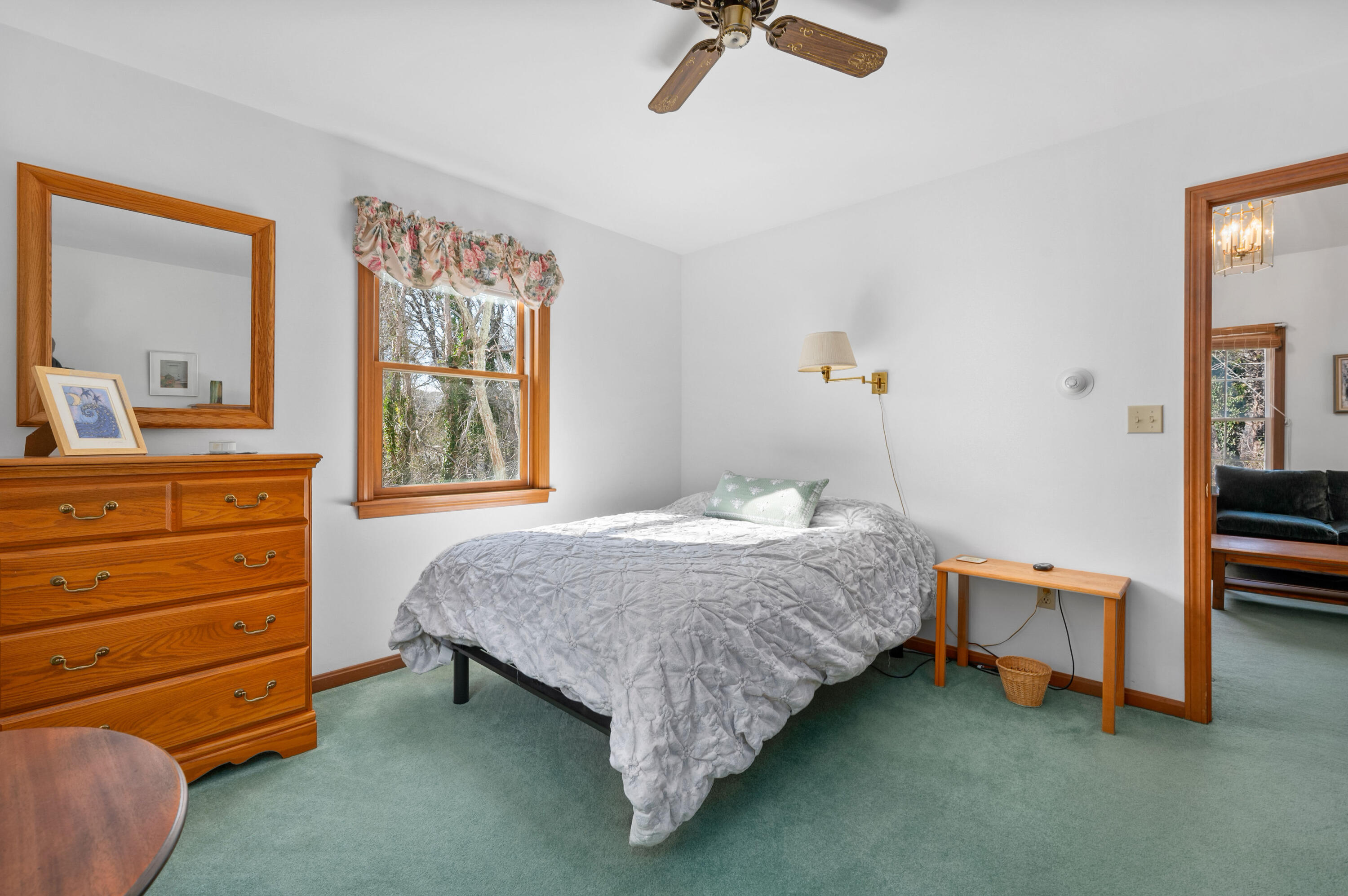 55 Bow Road Eastham, MA 02642 - Photo 21 of 44 a bed sitting in a bedroom next to a window