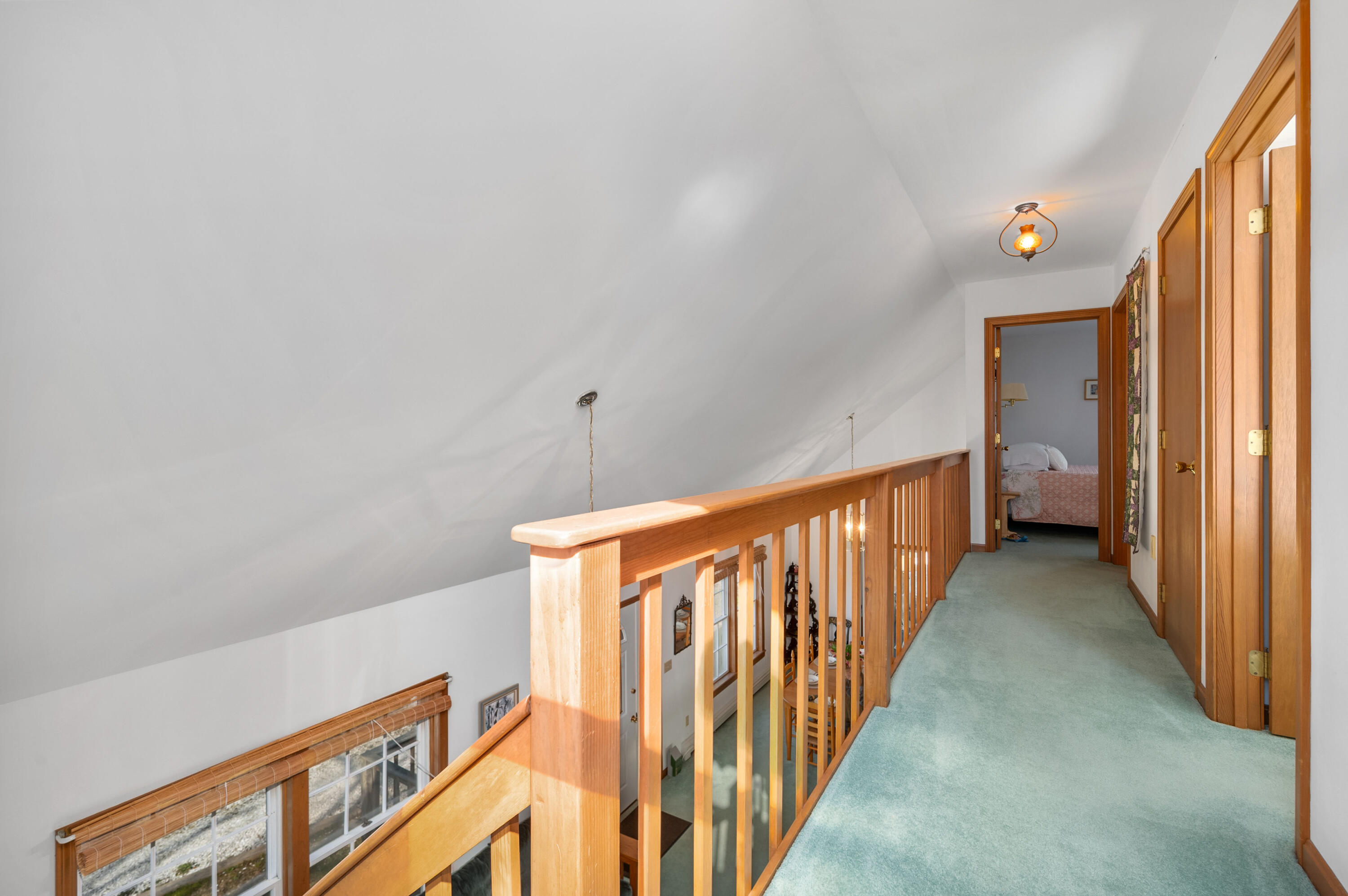 55 Bow Road Eastham, MA 02642 - Photo 23 of 44 a view of a hallway with stairs