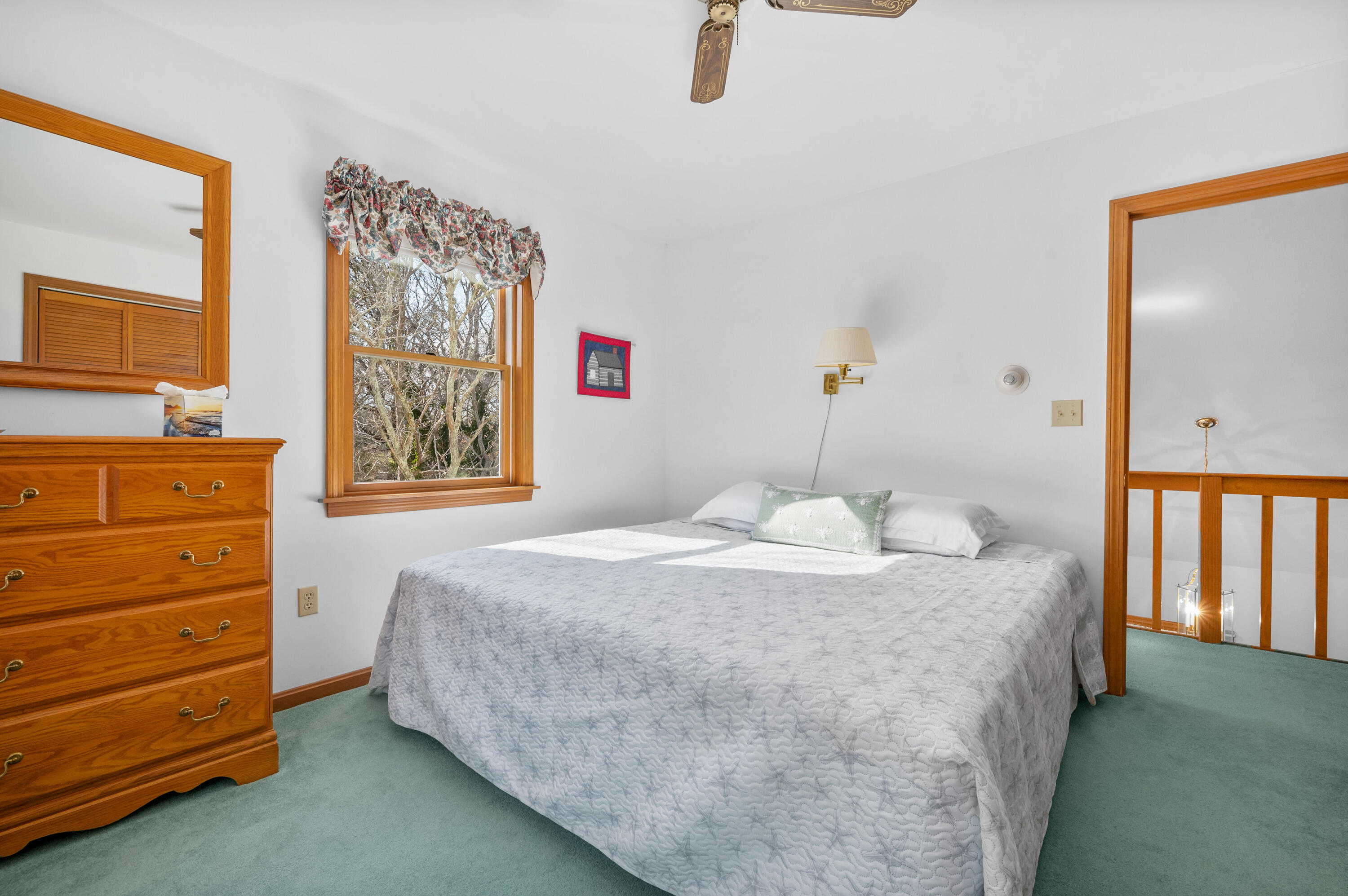 55 Bow Road Eastham, MA 02642 - Photo 25 of 44 a bedroom with a bed and a window