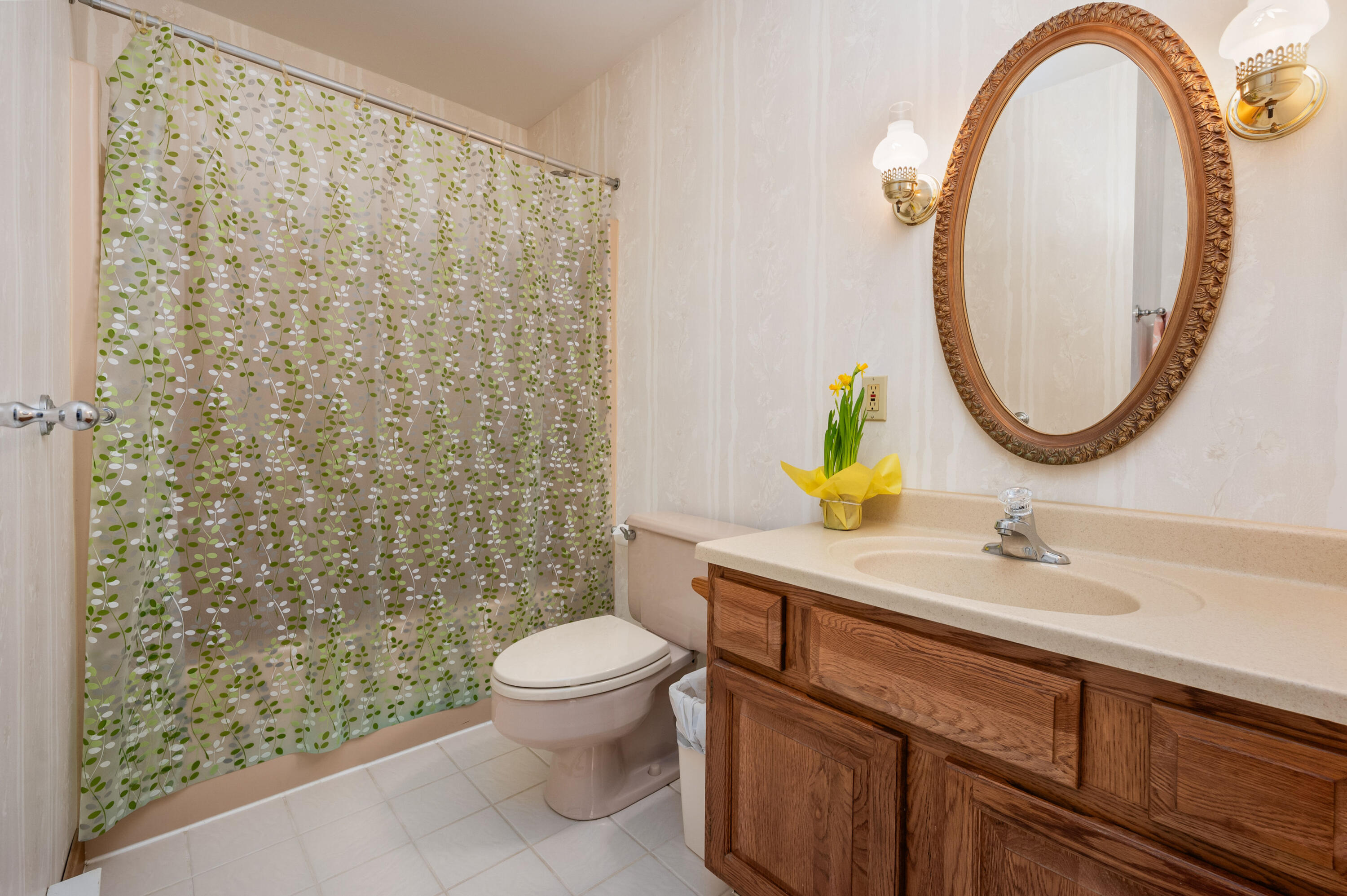 55 Bow Road Eastham, MA 02642 - Photo 26 of 44 a bathroom with a sink a toilet and a mirror