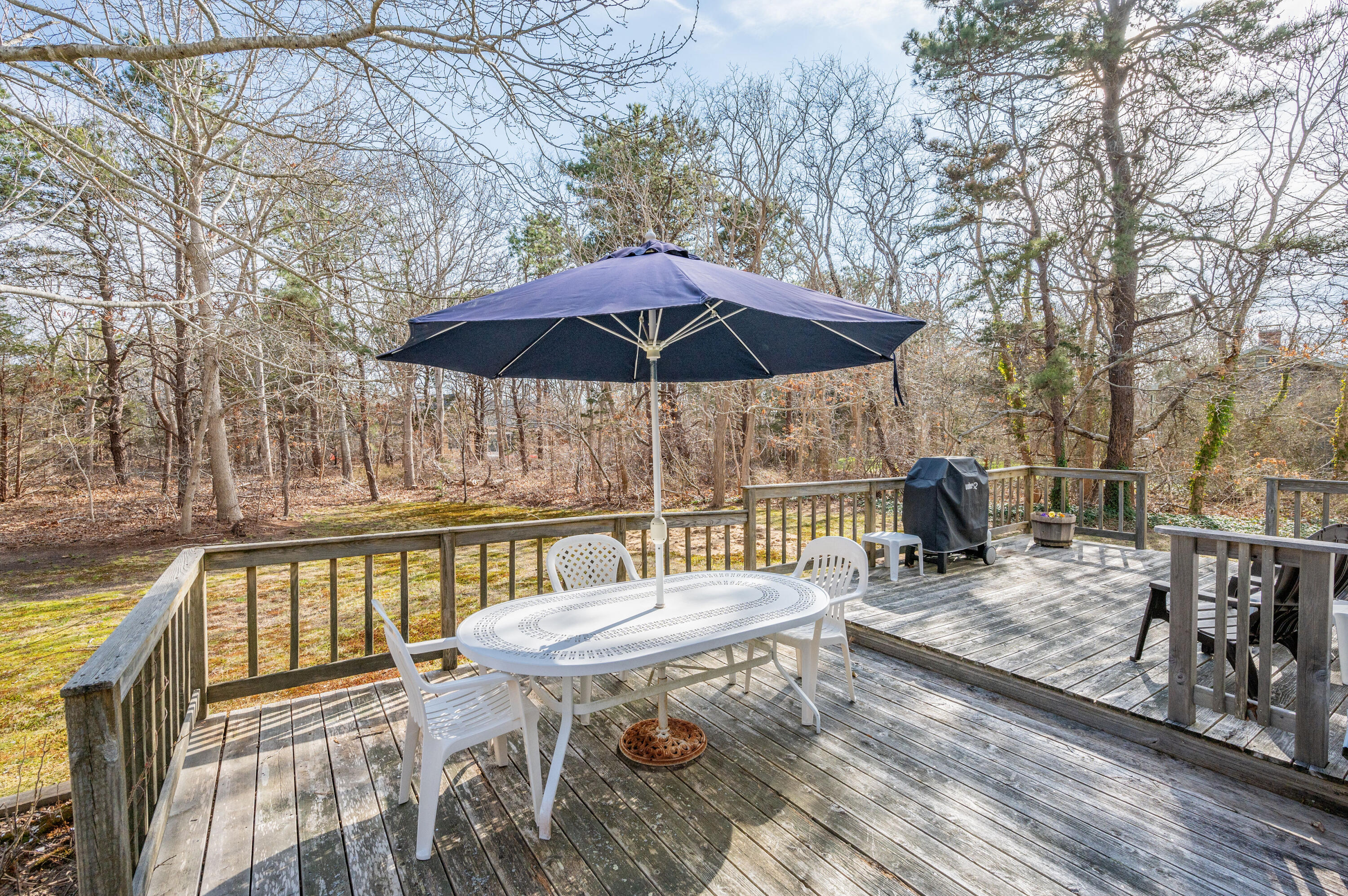 55 Bow Road Eastham, MA 02642 - Photo 36 of 44 a view of a chair and table on the wooden floor