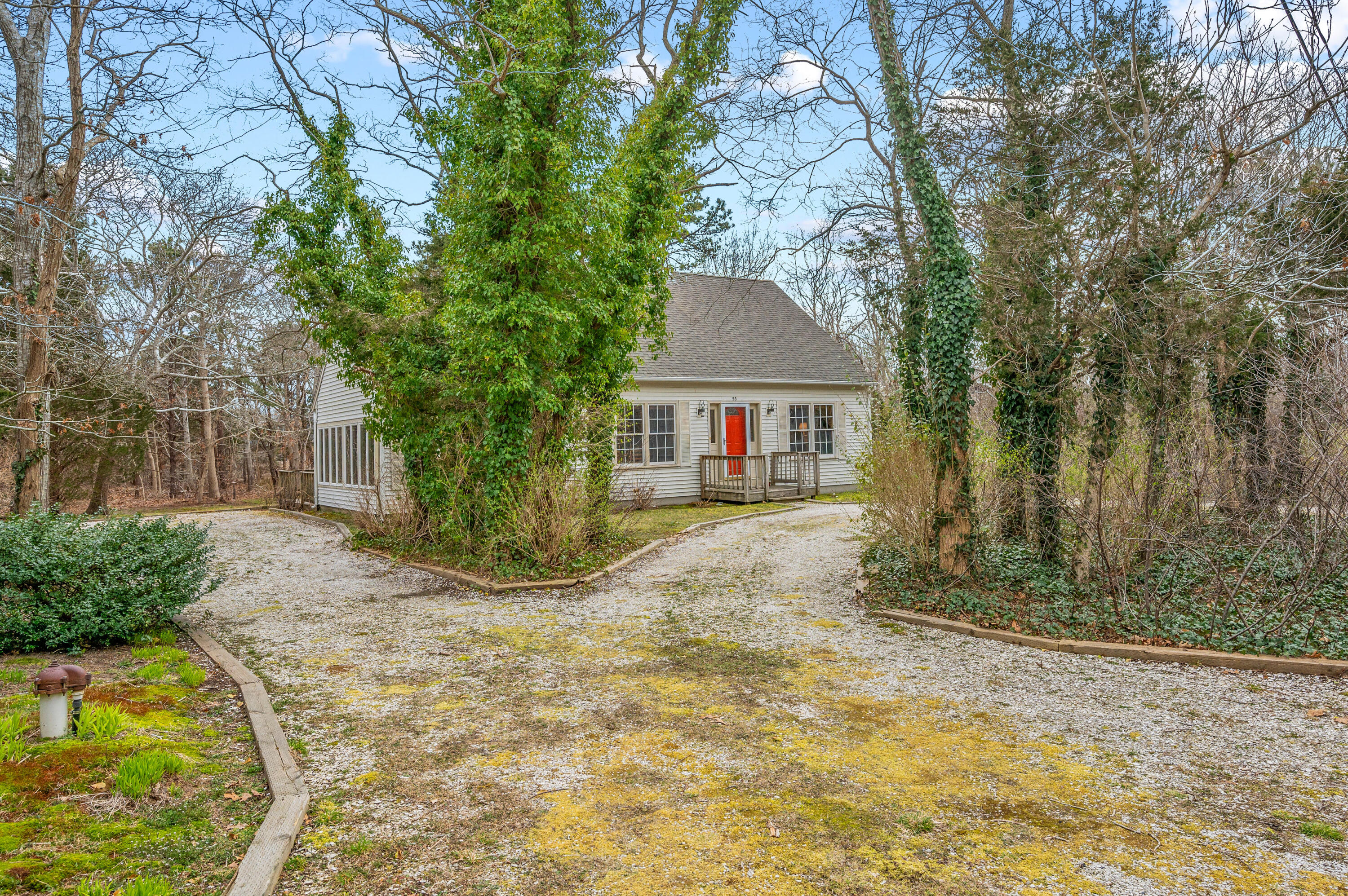55 Bow Road Eastham, MA 02642 - Photo 44 of 44 a front view of a house with garden