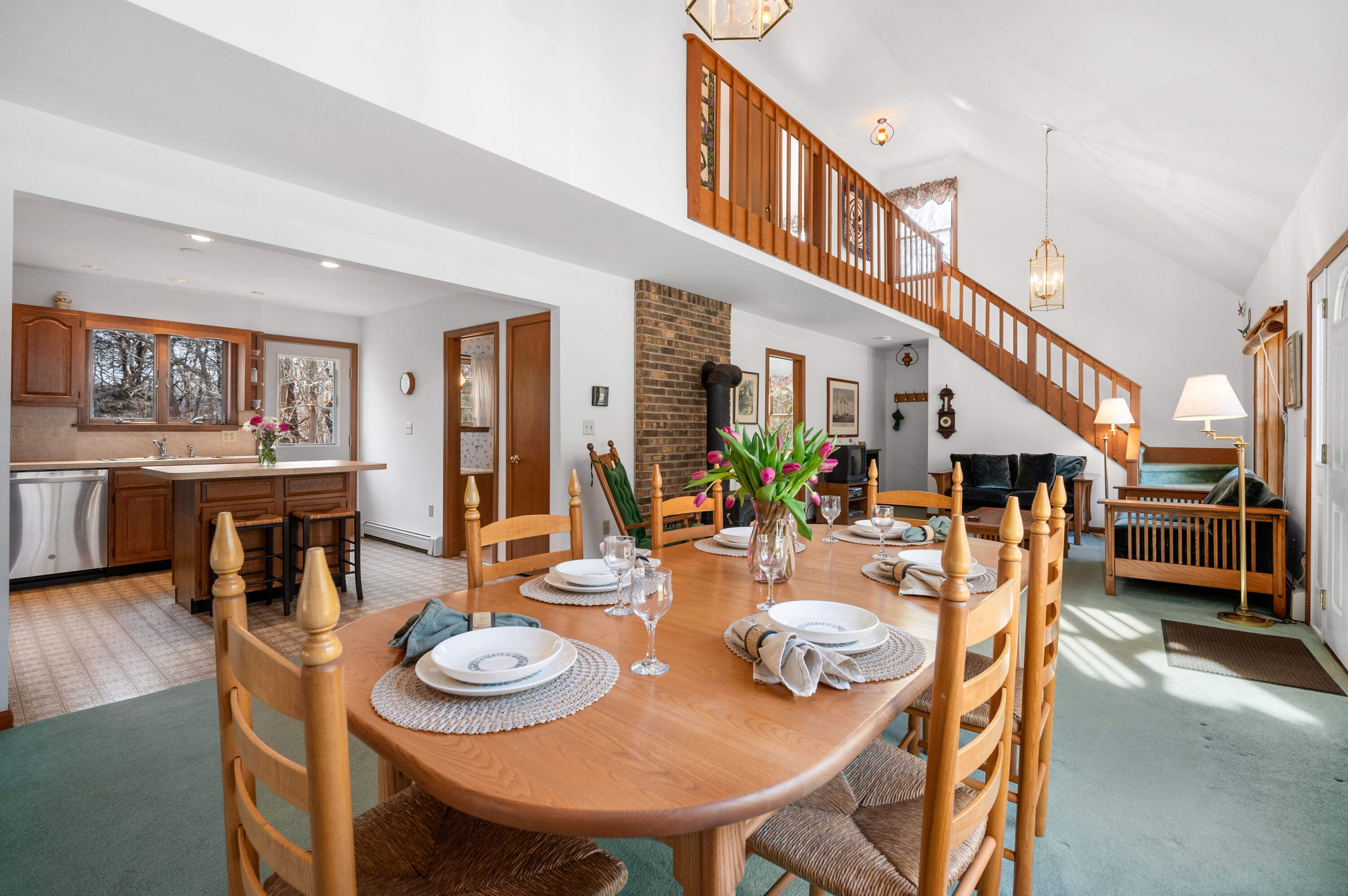 55 Bow Road Eastham, MA 02642 - Photo 9 of 44 a view of a dining room with furniture and wooden floor