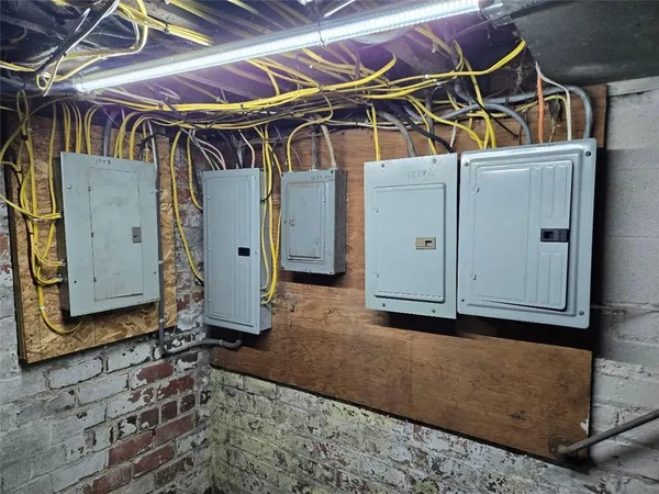 a view of a room with wooden walls