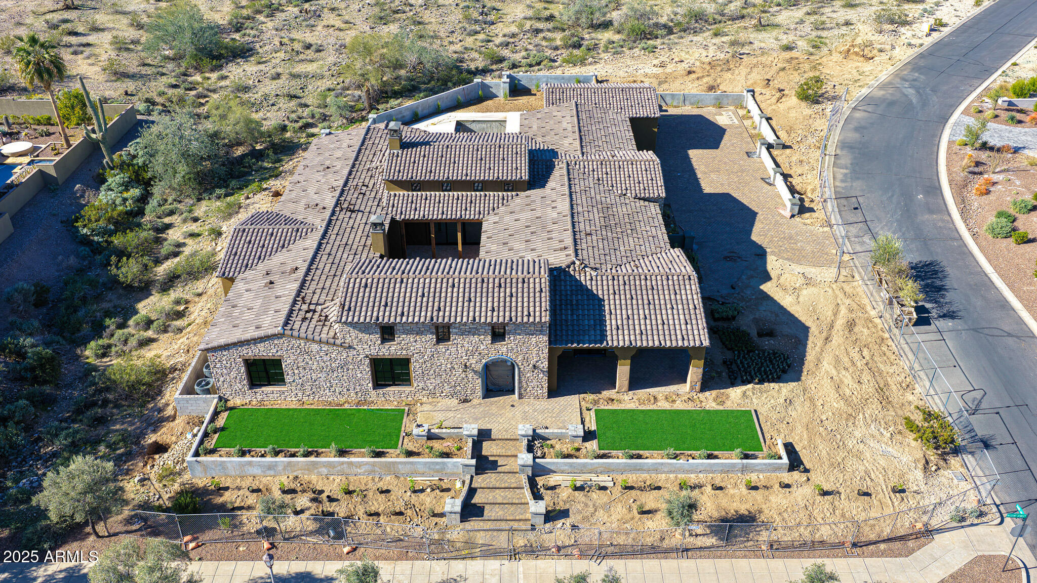 4572 North Regent Street Buckeye, AZ 85396 - Photo 11 of 25 a front view of a house with a garden