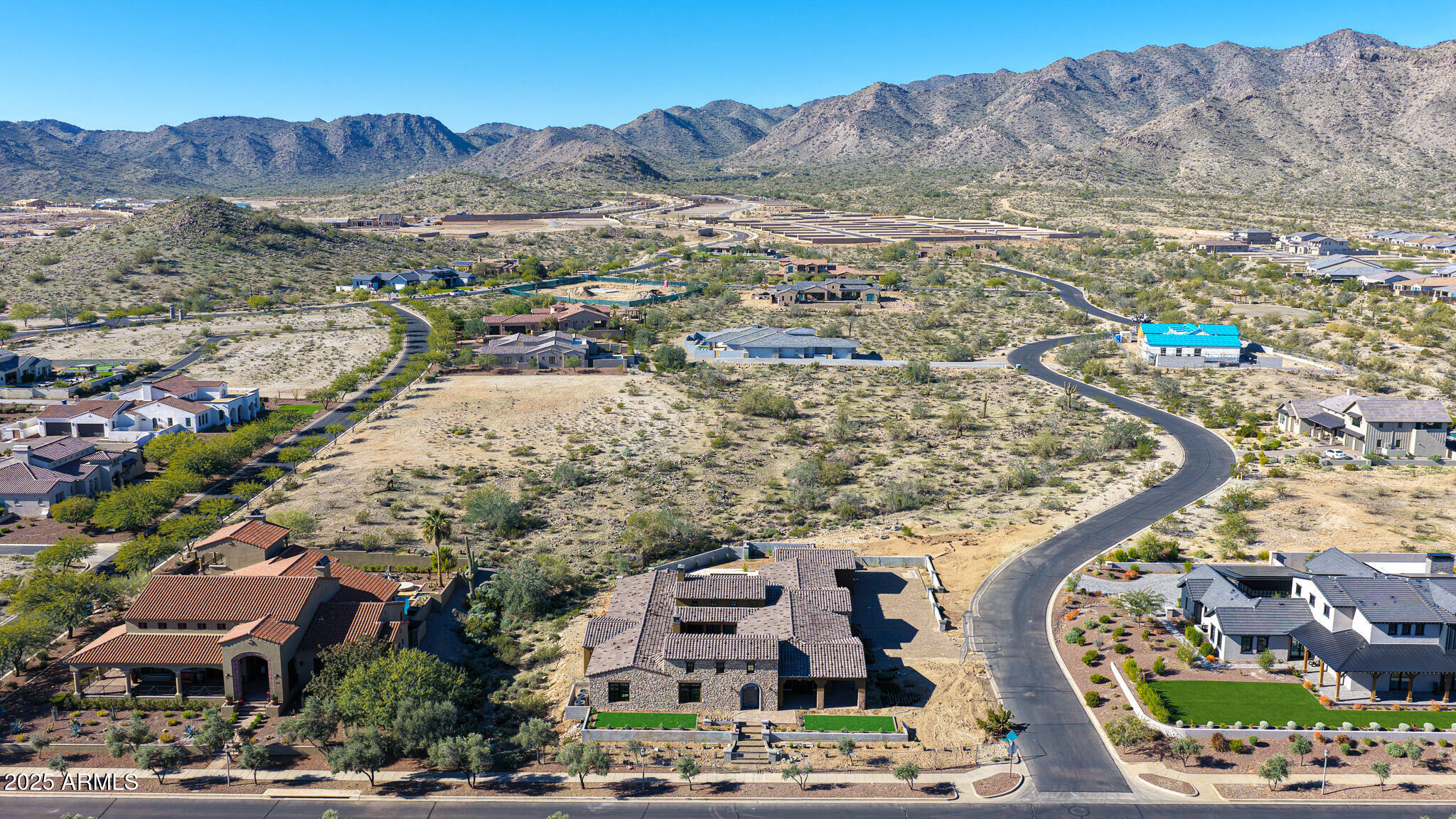 4572 North Regent Street Buckeye, AZ 85396 - Photo 19 of 25 an aerial view of residential houses with outdoor space and street view