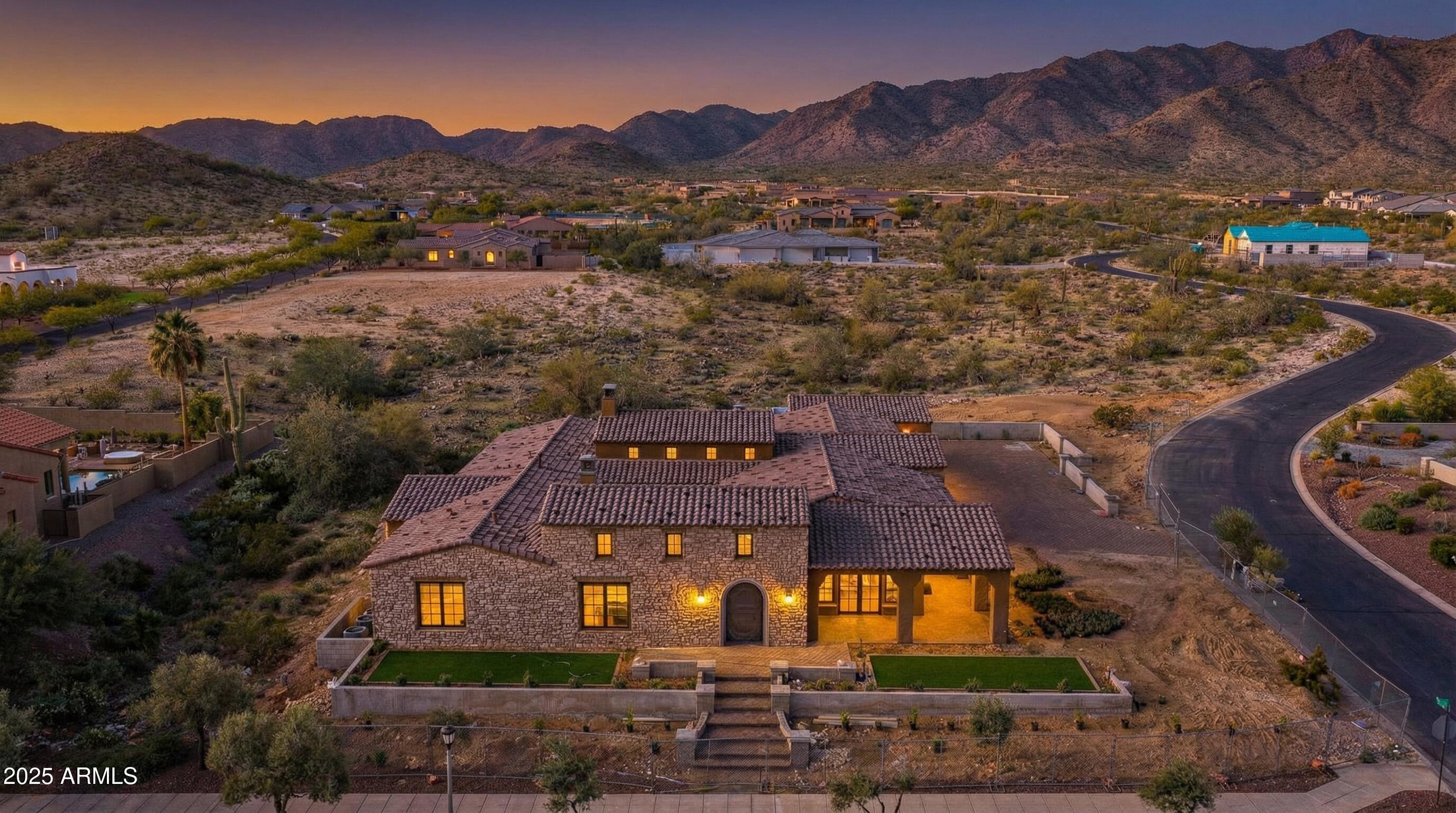 4572 North Regent Street Buckeye, AZ 85396 - Photo 3 of 25 an aerial view of residential houses with outdoor space
