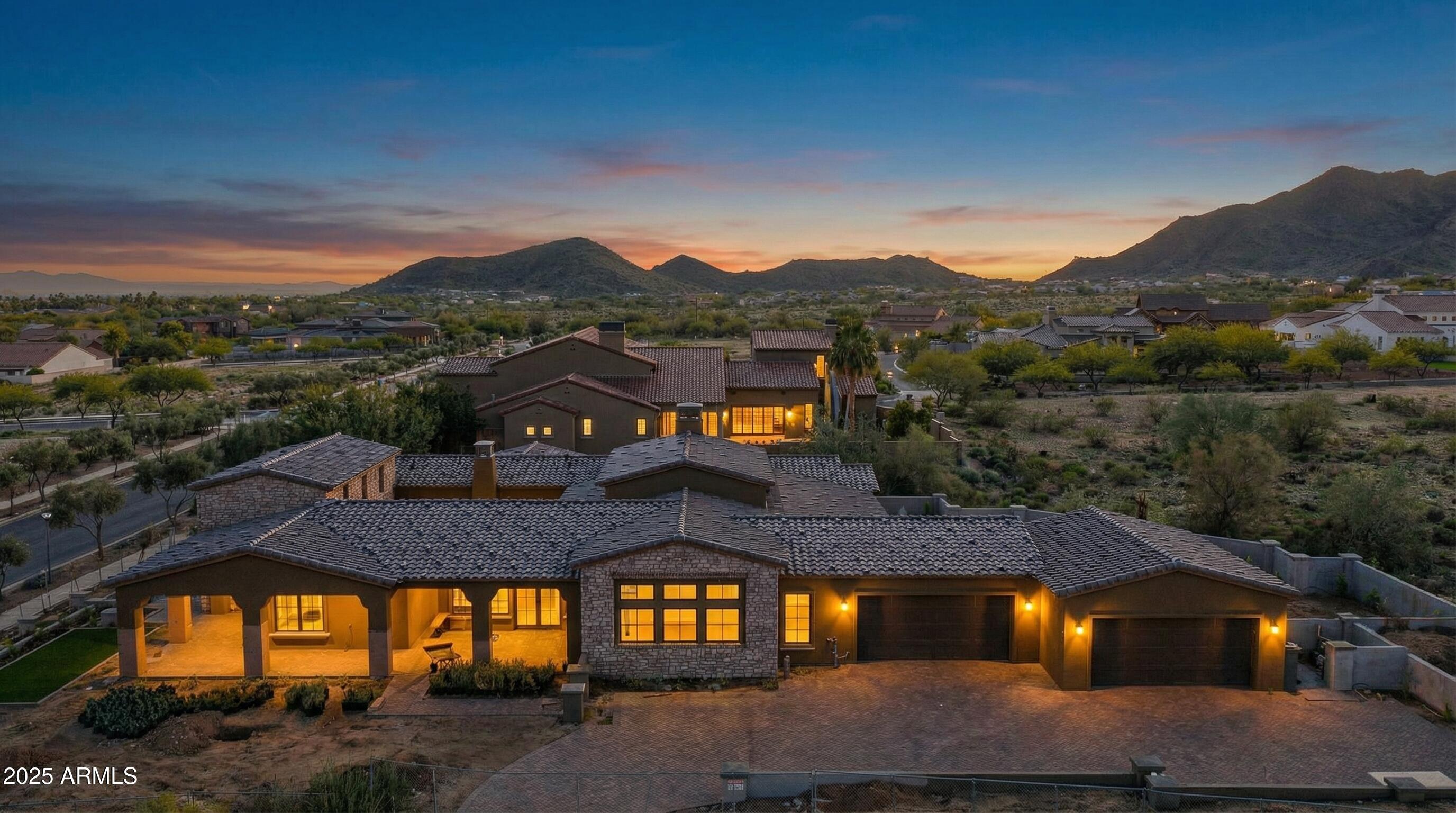 4572 North Regent Street Buckeye, AZ 85396 - Photo 5 of 25 a view of a big house with a big yard and large tree