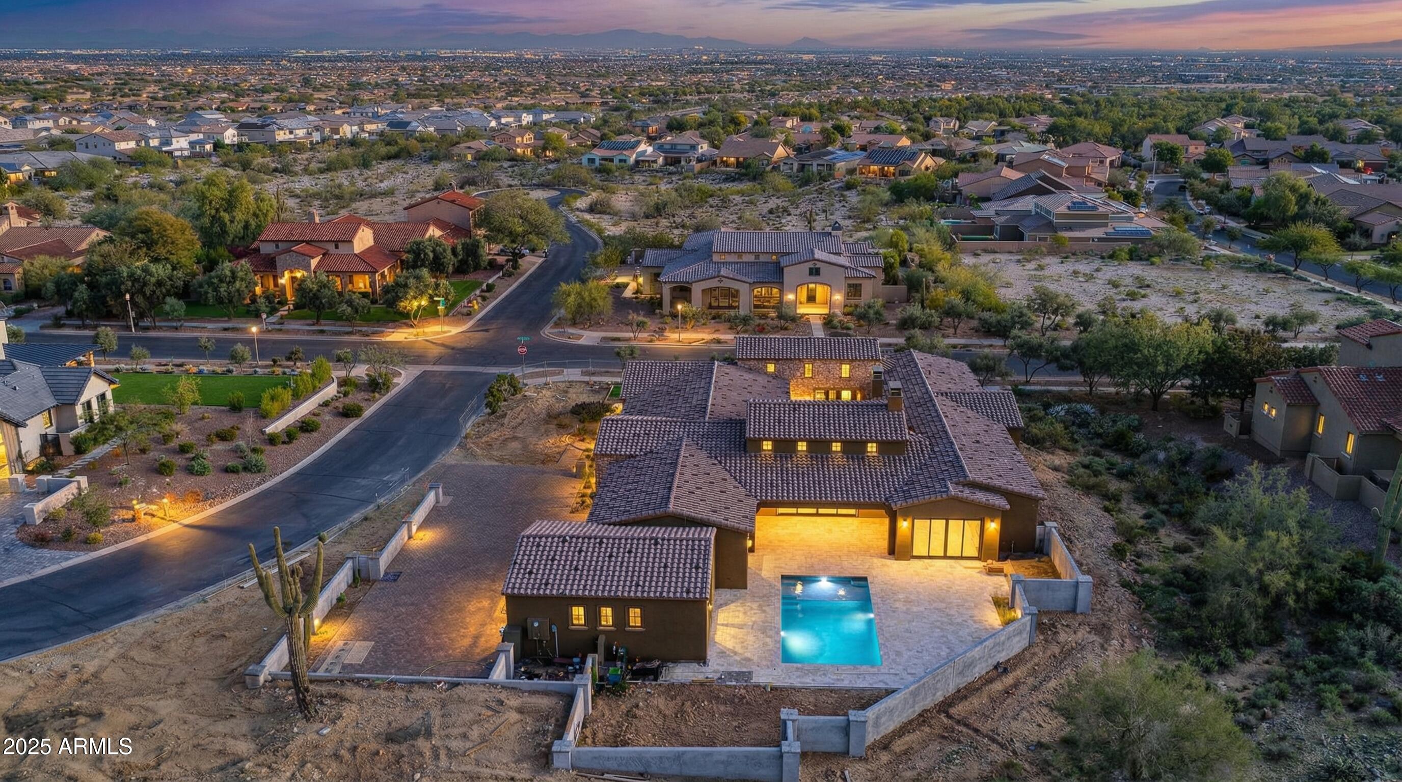 4572 North Regent Street Buckeye, AZ 85396 - Photo 7 of 25 an aerial view of a house with a swimming pool