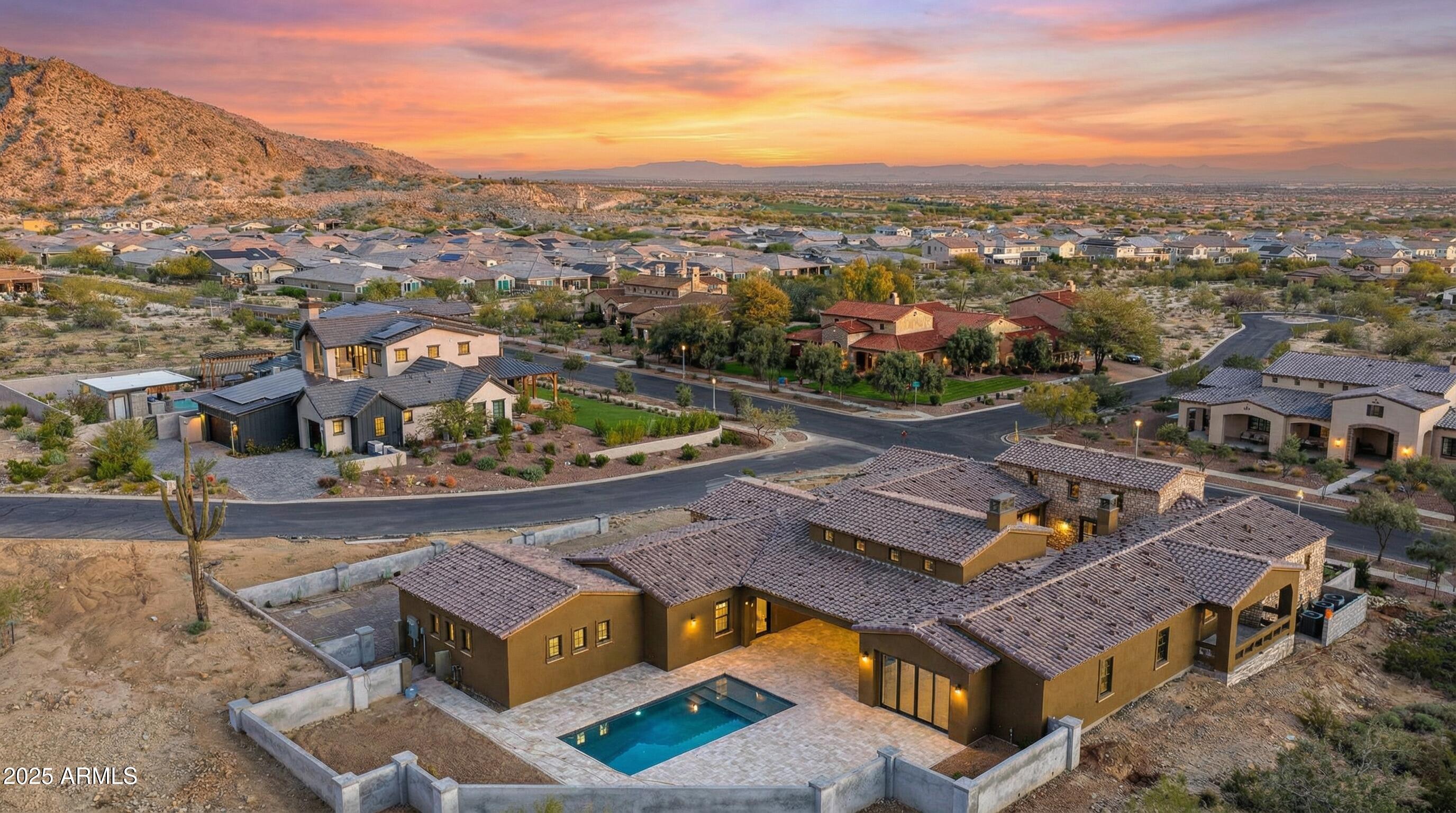 4572 North Regent Street Buckeye, AZ 85396 - Photo 8 of 25 an aerial view of residential houses with outdoor space and parking