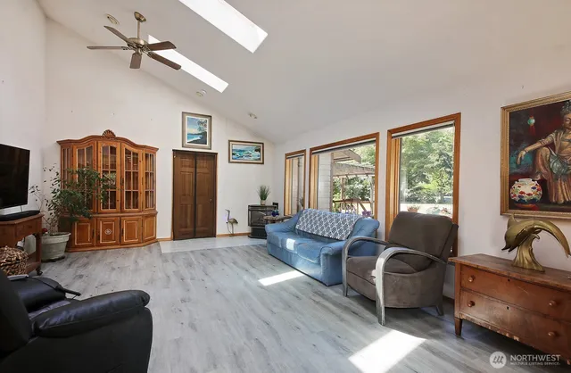 a kitchen with stainless steel appliances granite countertop a stove and a refrigerator