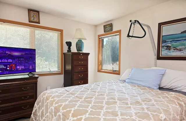 a bathroom with a sink double vanity and a mirror