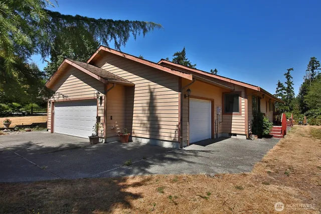 a view of a patio with furniture and a potted plants
