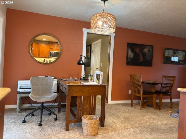 2130 Umpqua Road Woodburn, OR 97071 - Photo 15 of 21 a workspace room with furniture and chandelier