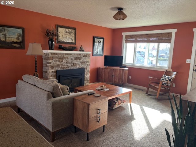 2130 Umpqua Road Woodburn, OR 97071 - Photo 3 of 21 a living room with furniture and a fireplace