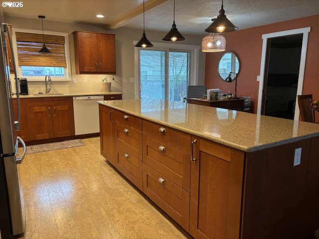 2130 Umpqua Road Woodburn, OR 97071 - Photo 6 of 21 a kitchen with stainless steel appliances granite countertop a sink a stove and a refrigerator