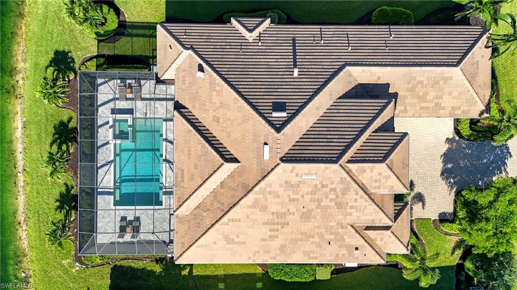 9177 Esplanade Boulevard Naples, FL 34119 - Photo 45 of 50 Aerial view of property and surrounding area featuring a pool