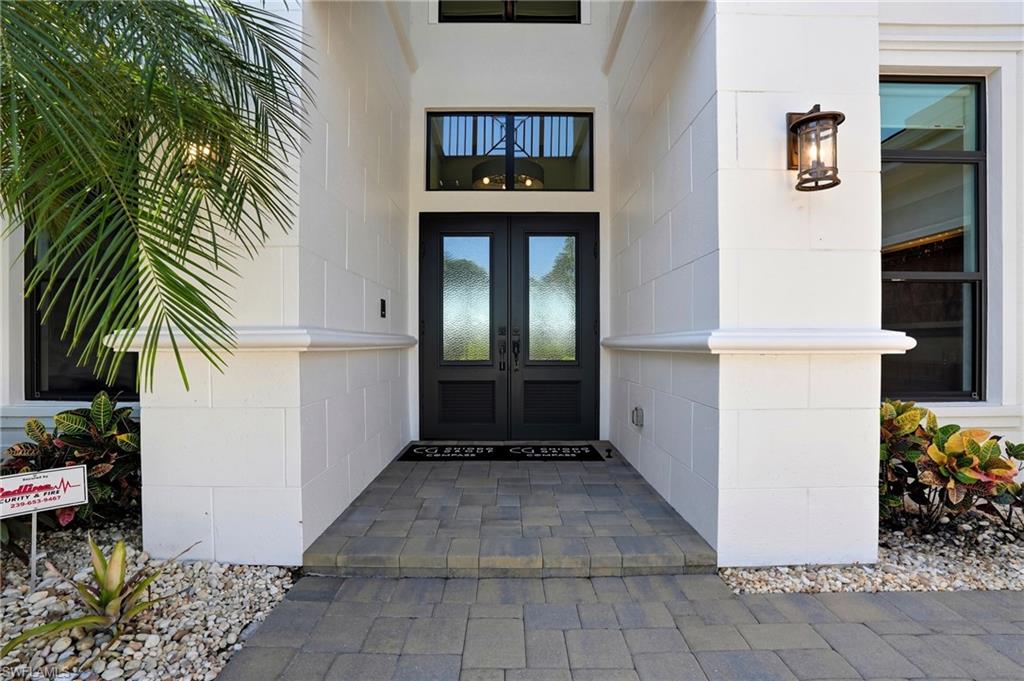 9177 Esplanade Boulevard Naples, FL 34119 - Photo 7 of 50 Doorway to property featuring french doors