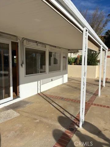 a house with yard in front of it