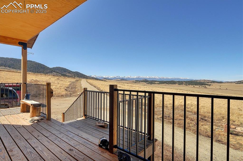 1115 Eagles Gate Road Westcliffe, CO 81252 - Photo 33 of 49 a view of wooden balcony with wooden floor and fence