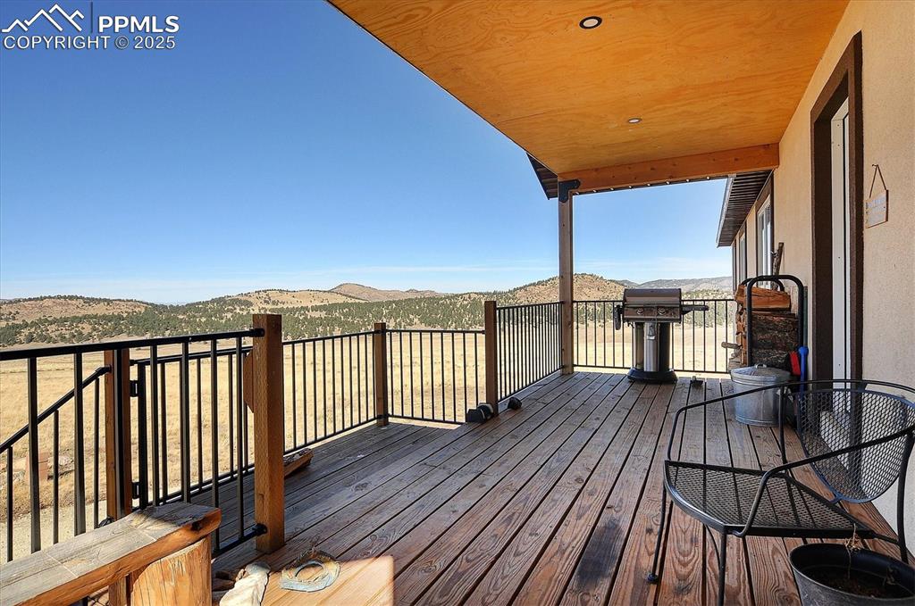 1115 Eagles Gate Road Westcliffe, CO 81252 - Photo 34 of 49 a view of balcony with wooden floor