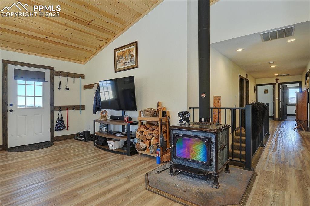 1115 Eagles Gate Road Westcliffe, CO 81252 - Photo 4 of 49 a living room with furniture and a flat screen tv