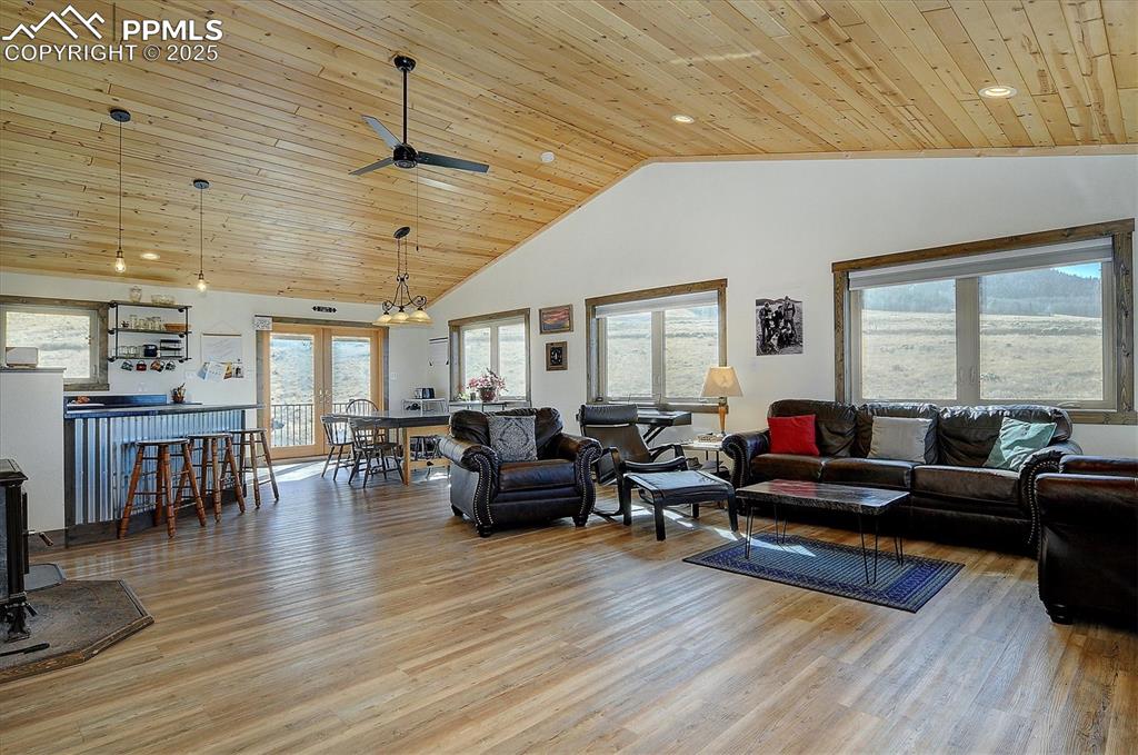 1115 Eagles Gate Road Westcliffe, CO 81252 - Photo 8 of 49 a living room with furniture and wooden floor
