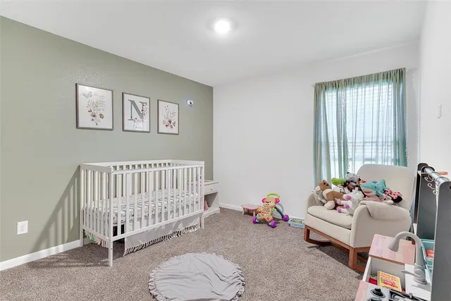 a bedroom with furniture and a bed