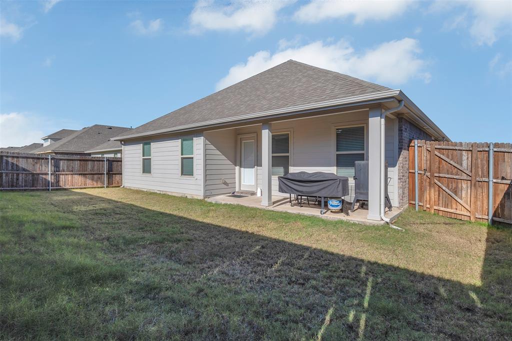 707 Range Drive Princeton, TX 75407 - Photo 22 of 29 a view of a house with a yard and sitting area