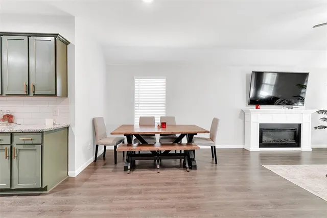 a view of a livingroom with furniture and a fireplace