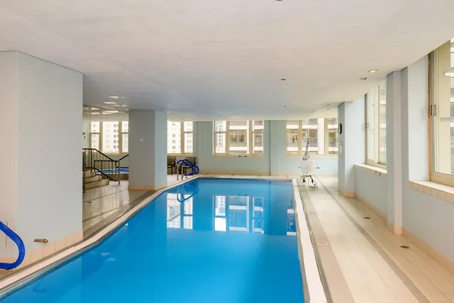 a large living room with a large window