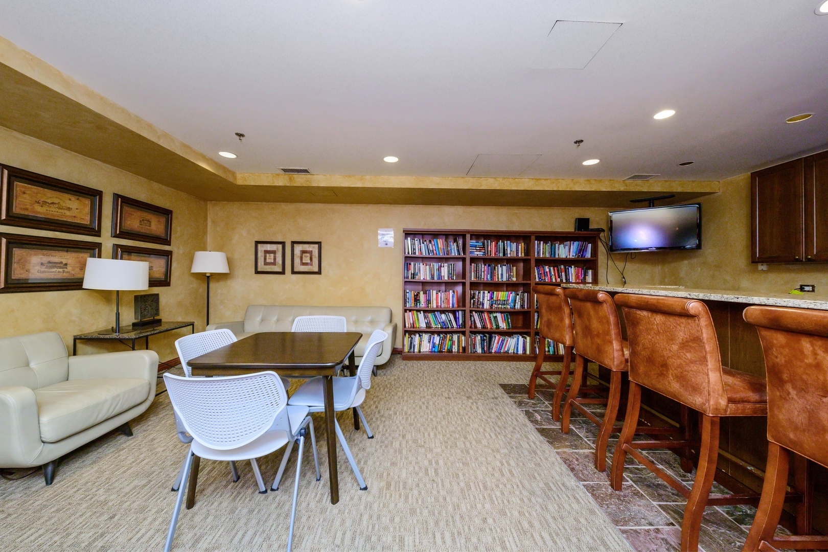 25 East Superior Street, Unit 1801 Chicago, IL 60611 - Photo 21 of 23 a living room with furniture and a wooden floor