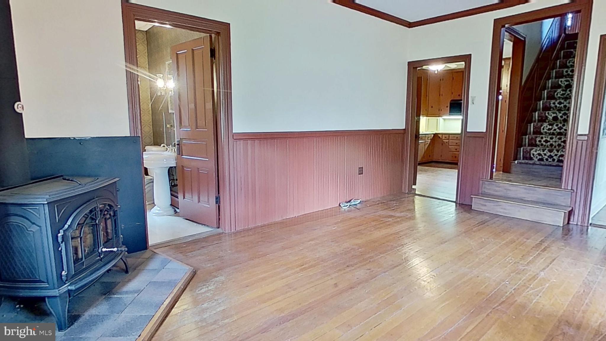 1447 Park Road Spring Grove, PA 17362 - Photo 3 of 13 a view of a hallway with entryway wooden floor and front door