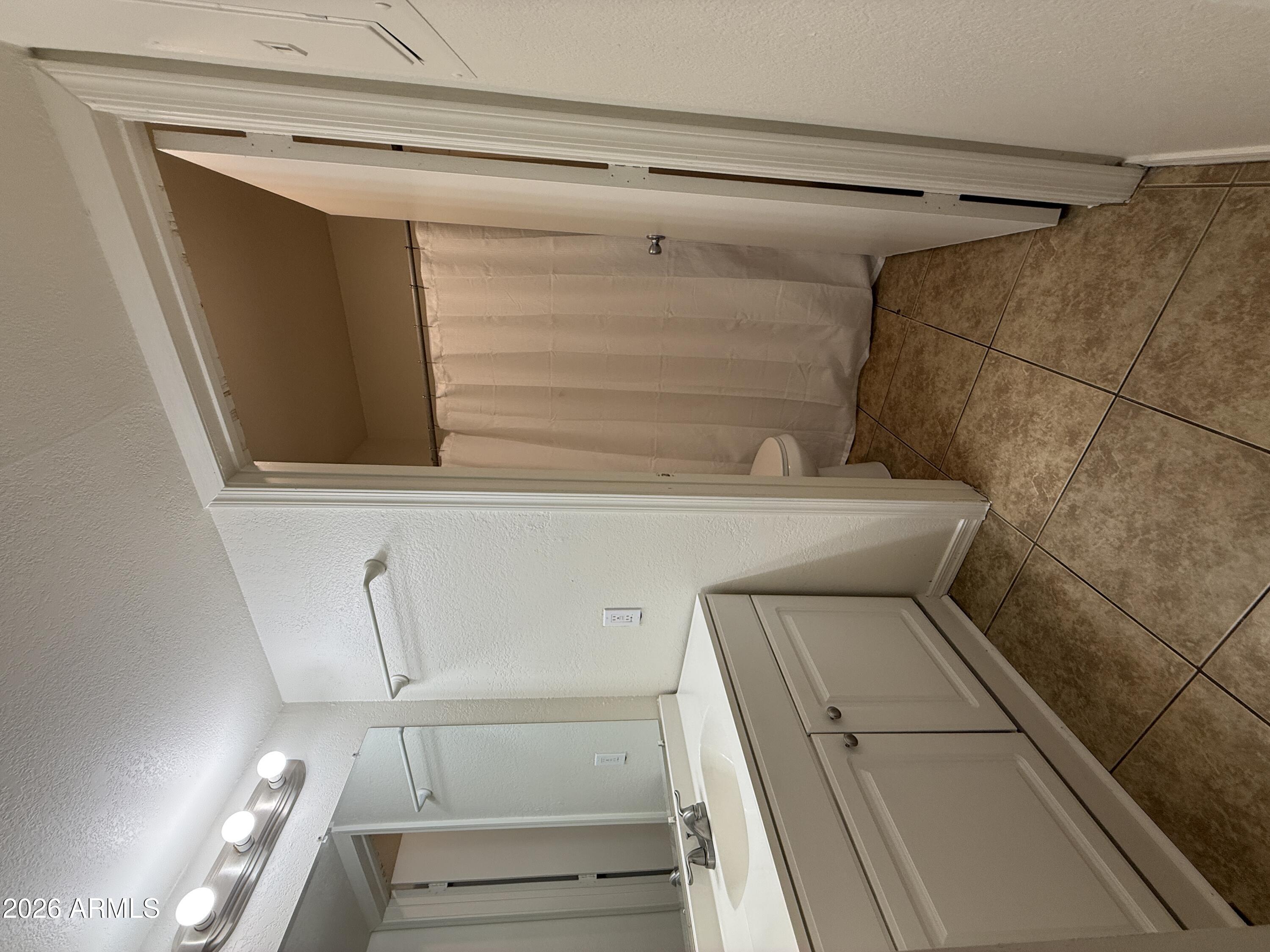 2650 East McKellips Road, Unit 105 Mesa, AZ 85213 - Photo 13 of 13 a utility room with dryer and washer