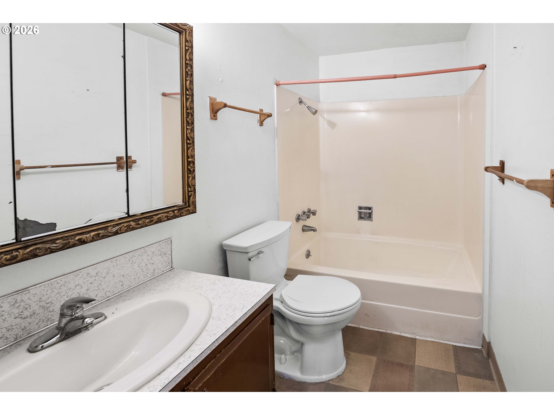 2440 Pine Street Seaside, OR 97138 - Photo 11 of 22 a bathroom with a sink toilet and shower