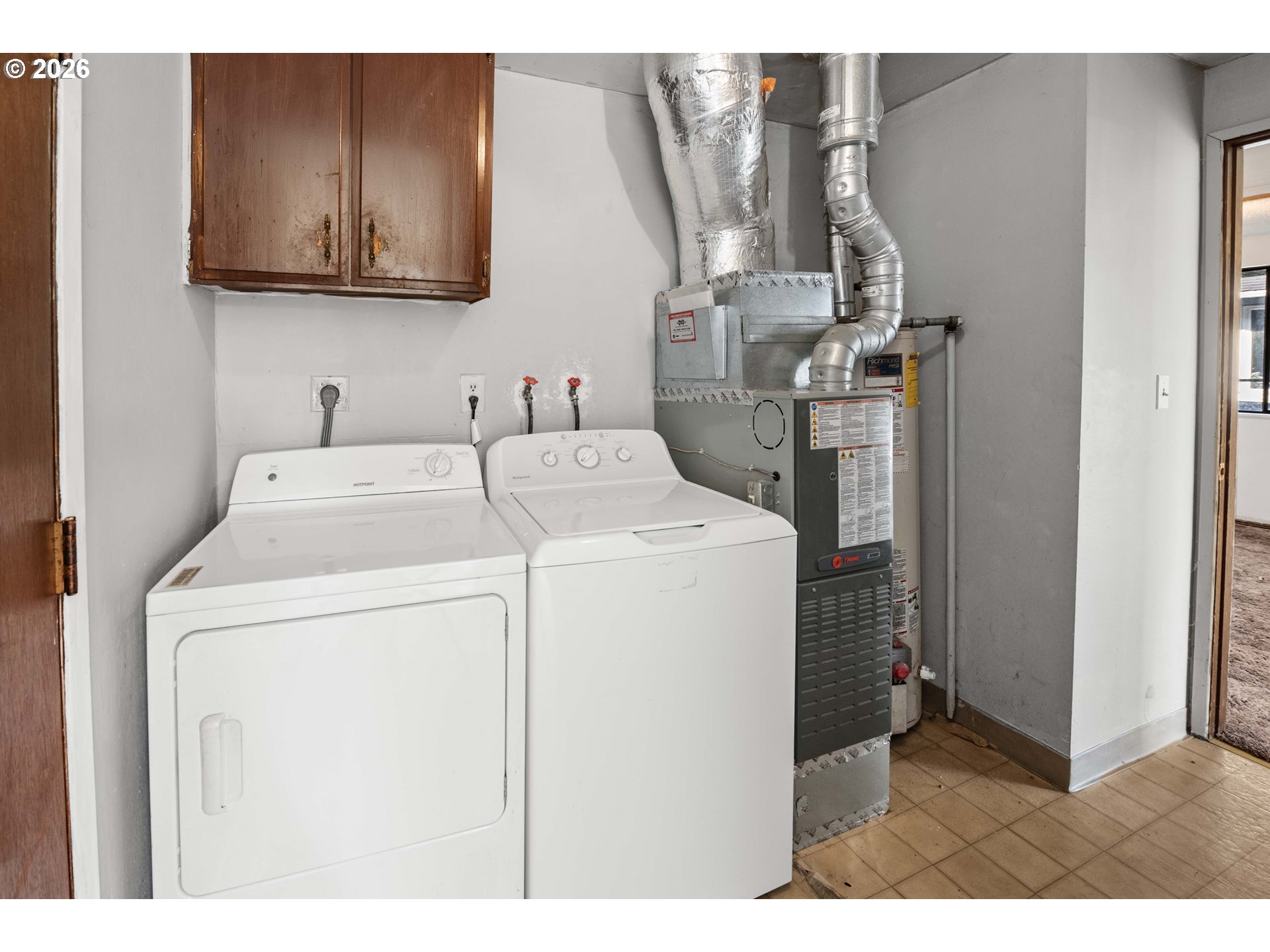 2440 Pine Street Seaside, OR 97138 - Photo 13 of 22 a utility room with dryer and washer